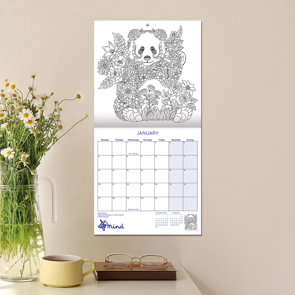 Inside adult colouring calendar January month with detailed Panda flowery design