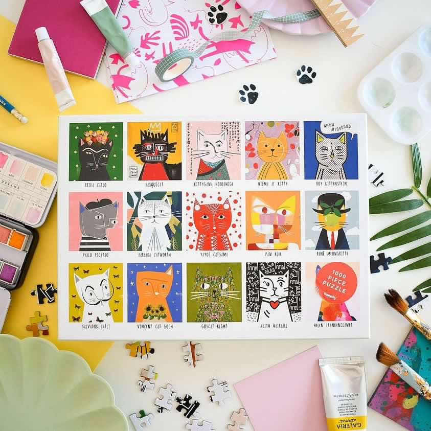 A lively puzzle displaying an array of cats in bright colours, inviting engagement and enjoyment for cat lovers.