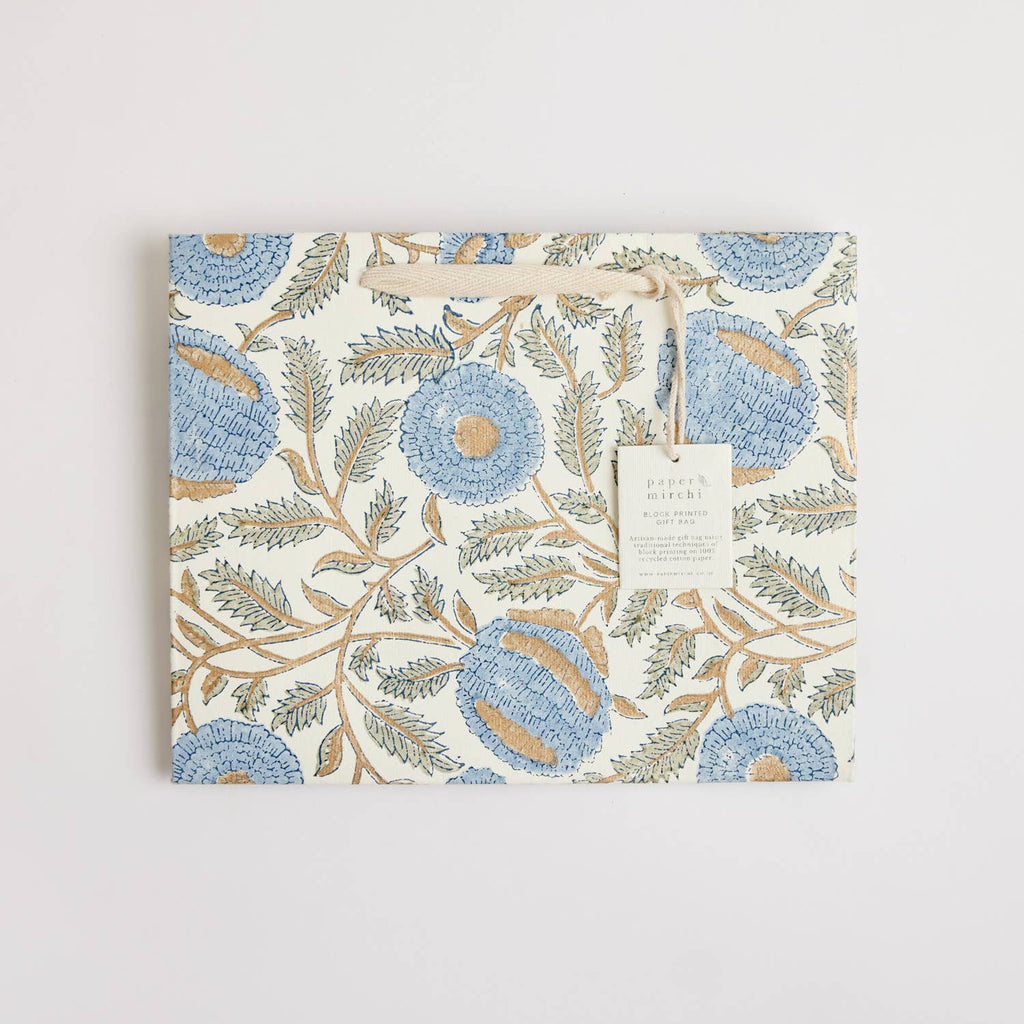 Hand block printed blue and white floral shopping bag made from recycled cotton card, complete with cotton rope handles.