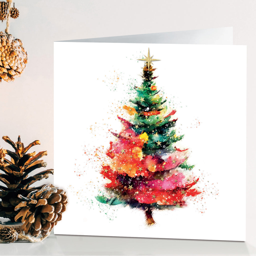 Bright Christmas tree with gold sparkling star on top in water colour painting style with abstract shades of yellow pink orange and red