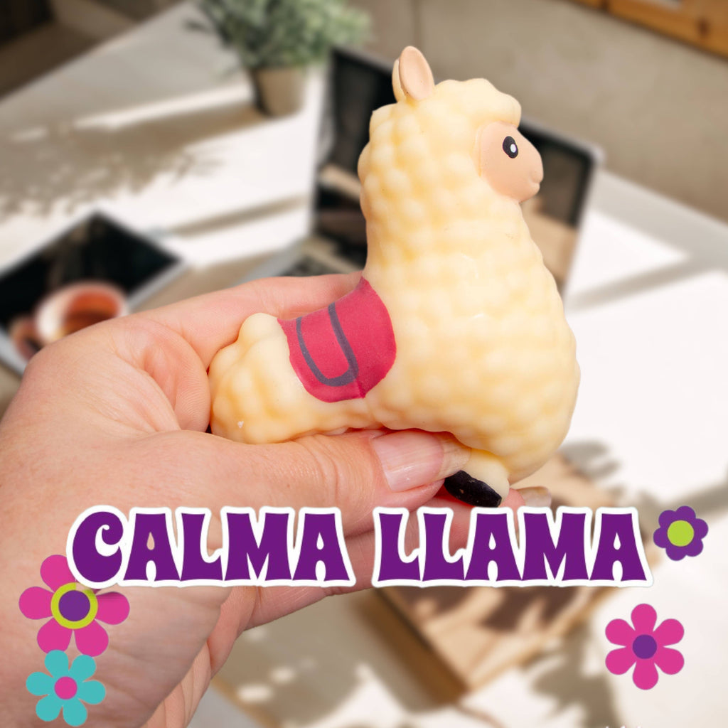 A person is seen holding a plush llama toy featuring the phrase "calma llama," representing relaxation and peace.
