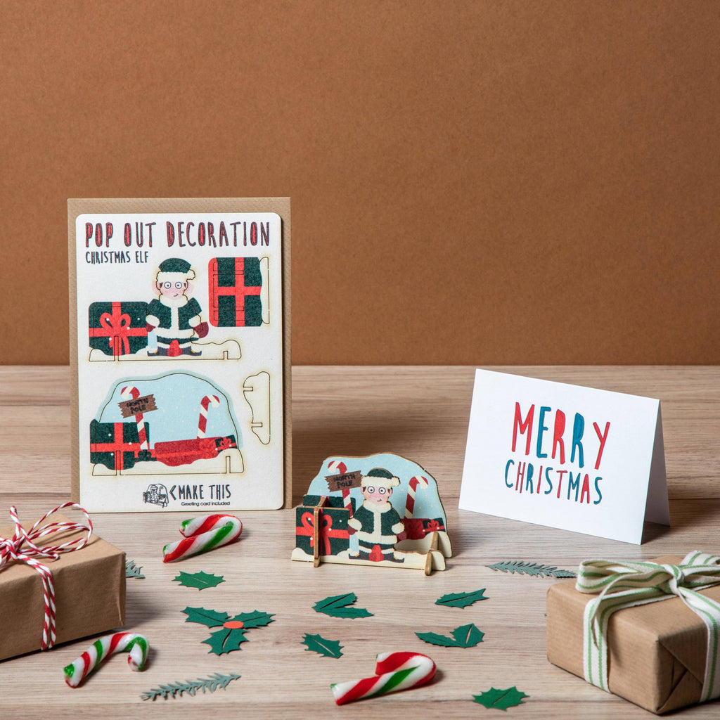 Christmas Elf Pop Out Christmas decoration standing card on a festive background