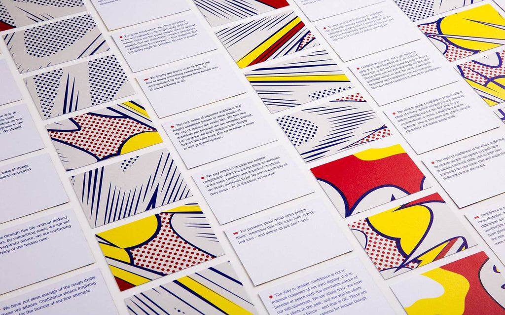 Multiple confidence cards laid out displaying their meaningful quotes and the corresponding pictures on the back.