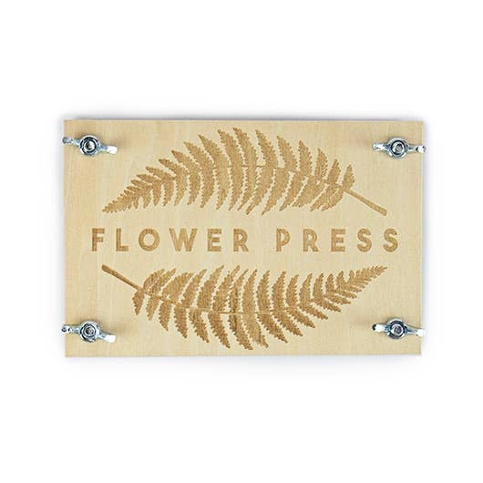 A charming wooden sign inscribed with "Flower Press," ideal for a nature-inspired setting or floral arrangement area.