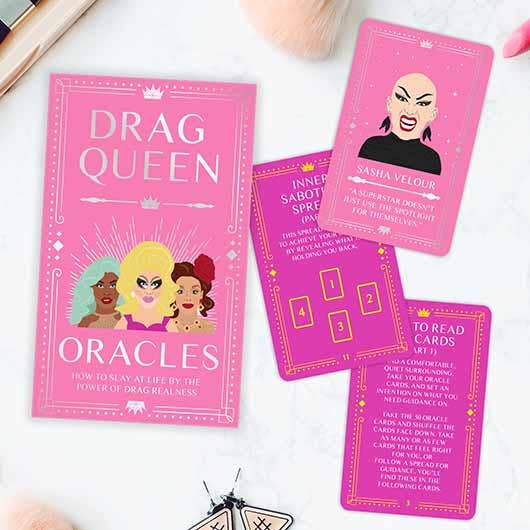 A vibrant drag queen oracle card game showcasing artistic designs and diverse characters for inspiration and entertainment.