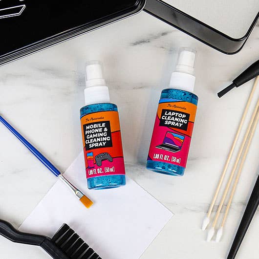 A table displays two bottles of cleaning products, each with distinct labels and designs.