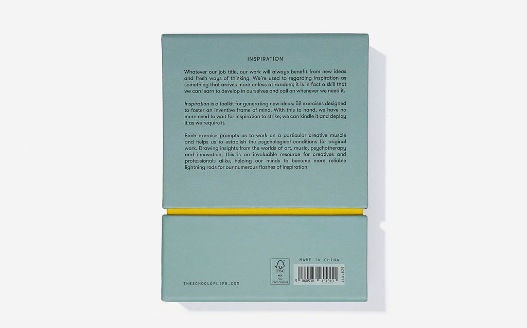 The back cover of a box of cards featuring a bright yellow border around the edges.