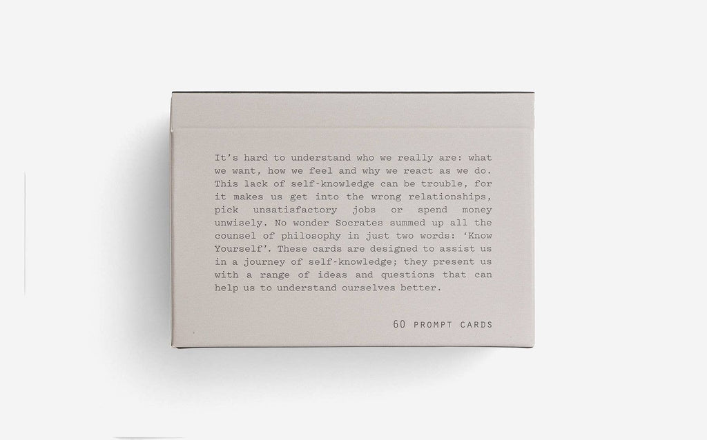 A white box featuring bold black text on its surface.