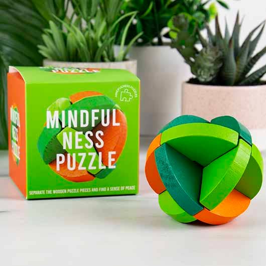 A colourful puzzle featuring a green and orange ball, perfect for engaging play and visual delight.