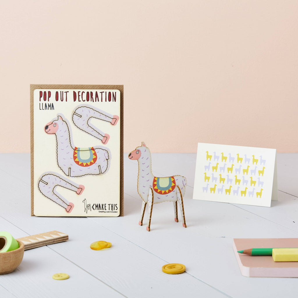 A card with a playful llama image paired with a second card that features a decorative sticker.