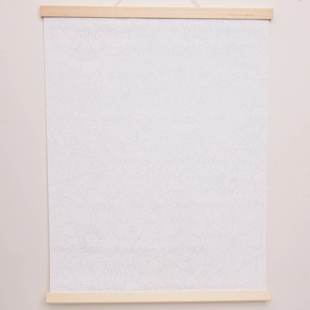 A white paper displayed in a wooden frame, mounted on a wall.