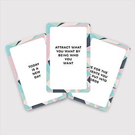 Three cards displaying different powerful affirmations in a colourful design.