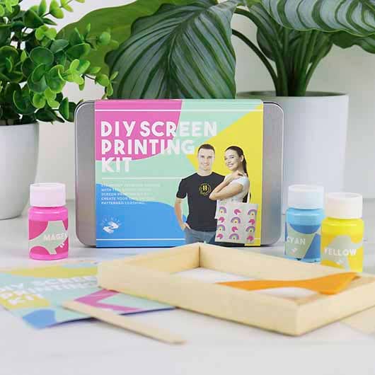 A DIY screen printing kit featuring paint, stencils, and tools for creative projects and artistic expression.